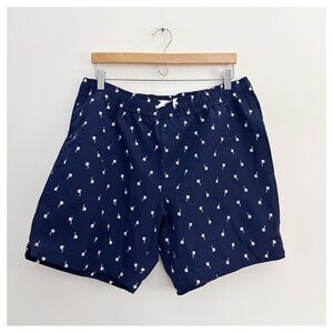 Onia Charles 7-inch swim trunk in blue/white embroidered palm tree pattern sz XL